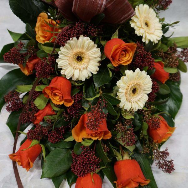 Funeral bouquet rose-skimmia-germini
