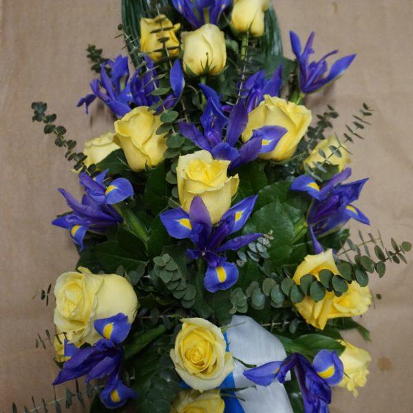 Funeral arrangement blue and yellow