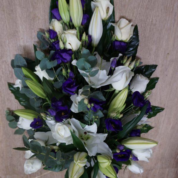Funeral arrangement blue and white